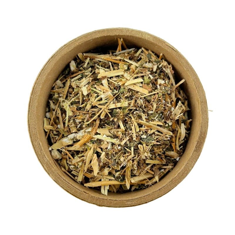 A top view of a bowl filled with cut wild lettuce leaves on a white background.