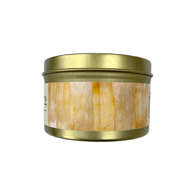 Hand-poured Abundance Intention Candle in an elegant gold travel tin for home manifestation rituals.