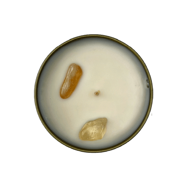 Top-down view of Abundance Candle showing genuine Citrine crystal stones in natural soy wax