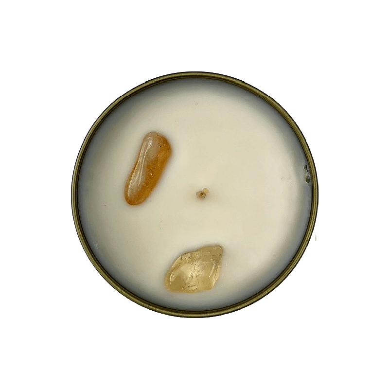 Top-down view of Abundance Candle showing genuine Citrine crystal stones in natural soy wax