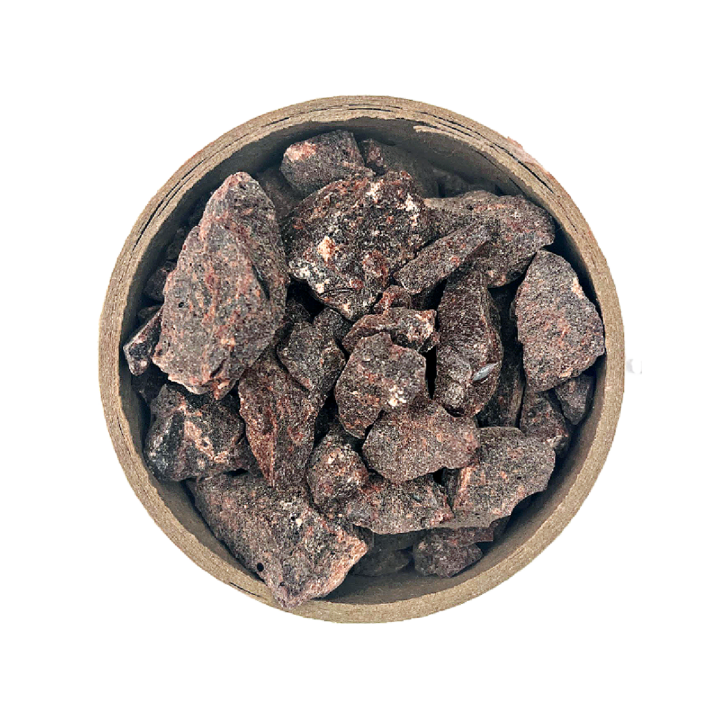 Dragon's Blood Resin in a brown bowl set on a white background
