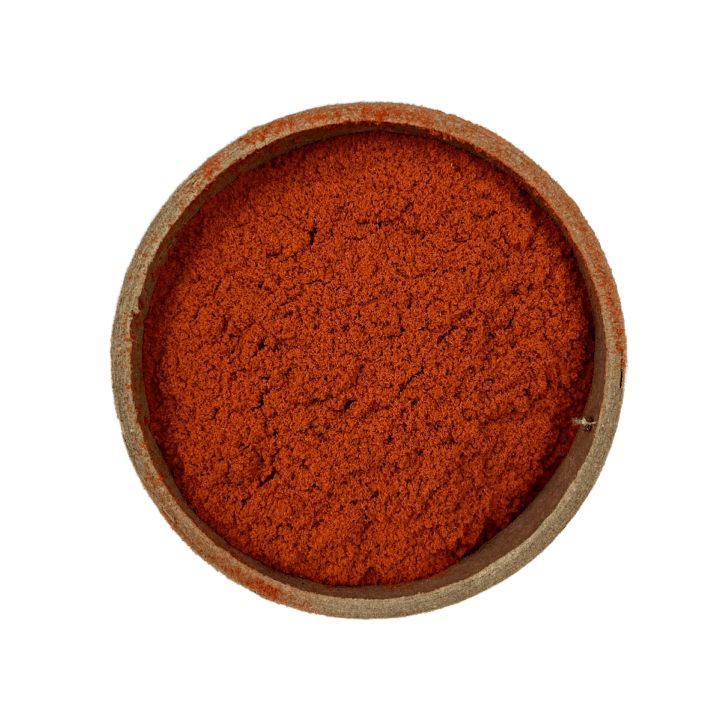 Red Sandalwood Powder in a brown brown bowl set on a white background
