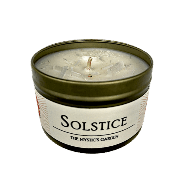 Solstice Candle Solstice Candle in gold tin with white label set on white background