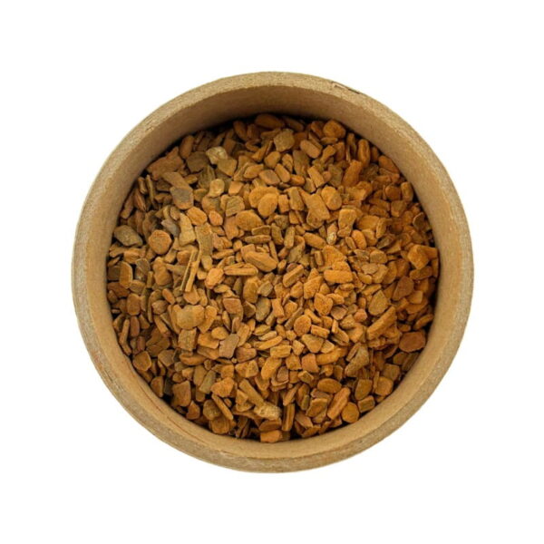 A top view of a bowl filled with instant coffee granules, isolated on a white background.