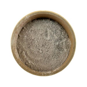 A top-down view of a round container filled with Irish Moss powder, isolated on a white background.