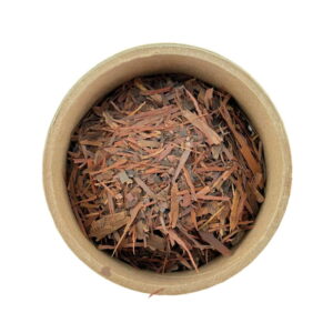 A top-down view of a round container filled with paud'arco herb, isolated on a white background.