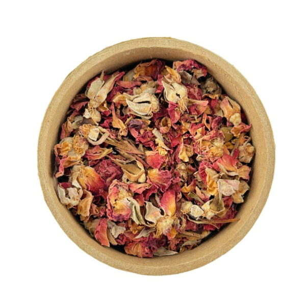 A round cardboard container filled with rose petals and buds isolated on a white background.