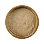 A round container filled with wild yam root powdered herb, against a white background.